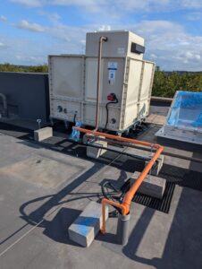 Pump and Tank Sprinkler System for The Vicarage - tank on the roof